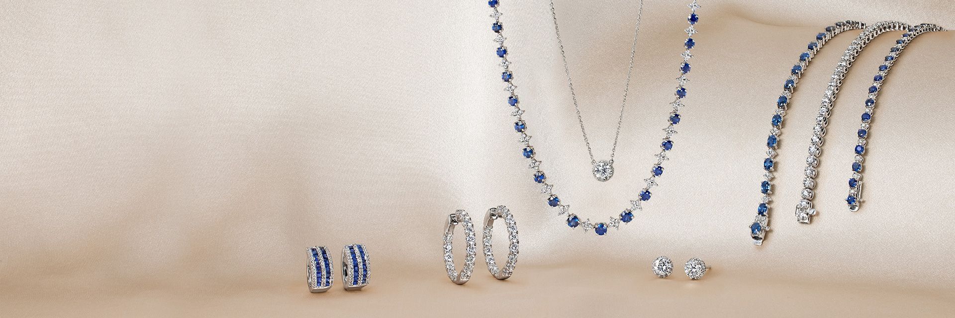 Blue Nile diamond jewelry including earrings, a necklace and bracelets